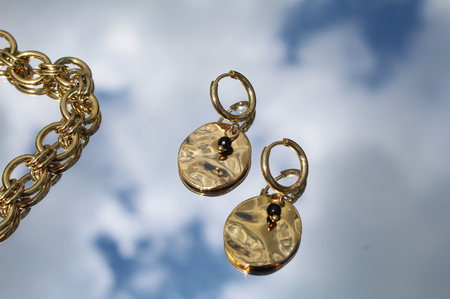 Boucles d'oreilles médaille